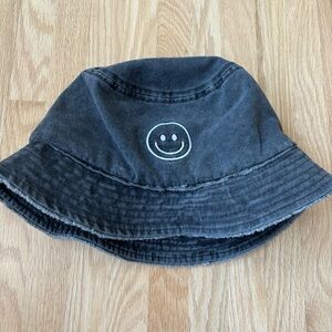 Dark gray blue smiley face bucket hat from David and Young